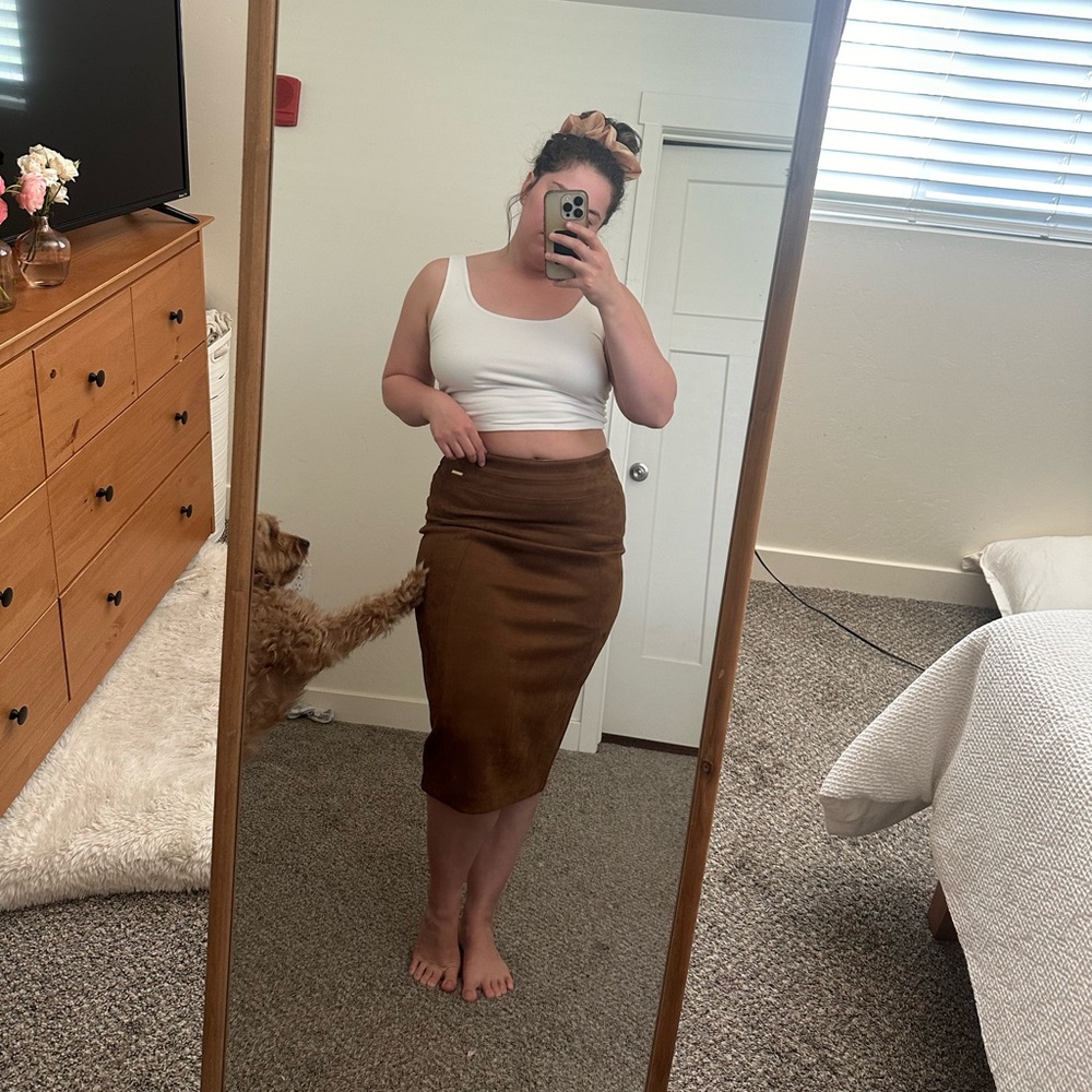Brown sued like pencil skirt